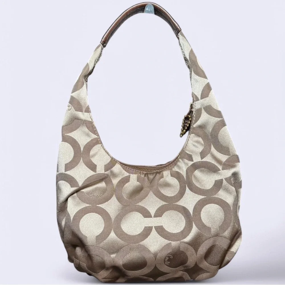 Coach Brown Signature One Shoulder Hobo Bag with bronze leather